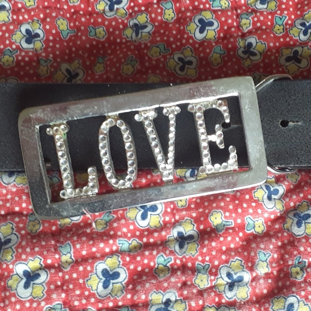 Black leather belt with silver and rhinestone buckle